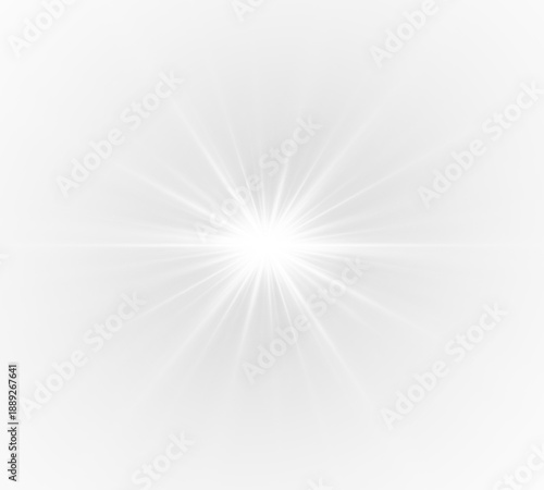 Bling lens flare with spark and sunburst explosion. Bright light rays and glowing starlight in a festive abstract overlay.