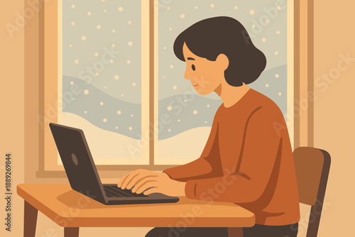 Person works on laptop at table by window with snow outside during winter