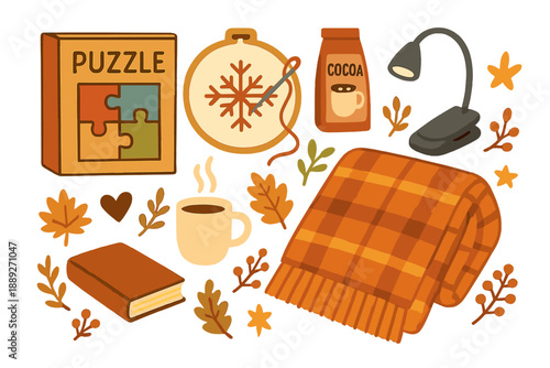 Cozy indoor scene with puzzle, hot drink, warm blanket, and autumn leaves during a cold afternoon