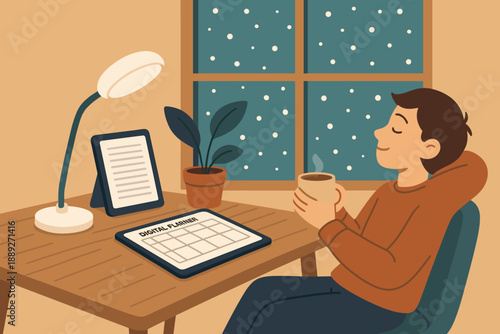 Young person enjoys warm drink while planning on digital device at home during winter night