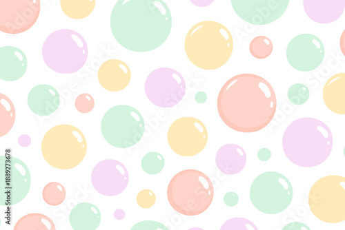 Colorful bubbles fill the background in a pattern with different sizes and soft shades on a white surface