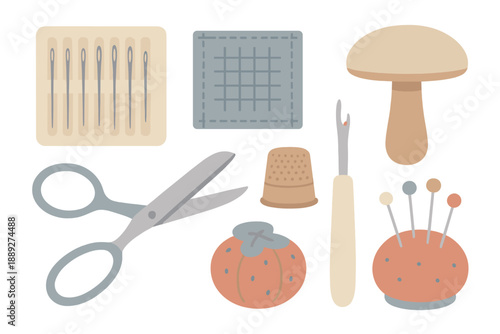 Craft tools and materials for sewing and sewing projects on a white background