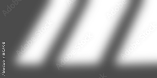 Fotografija Soft window light beams on dark wall, minimalist architectural shadow and light