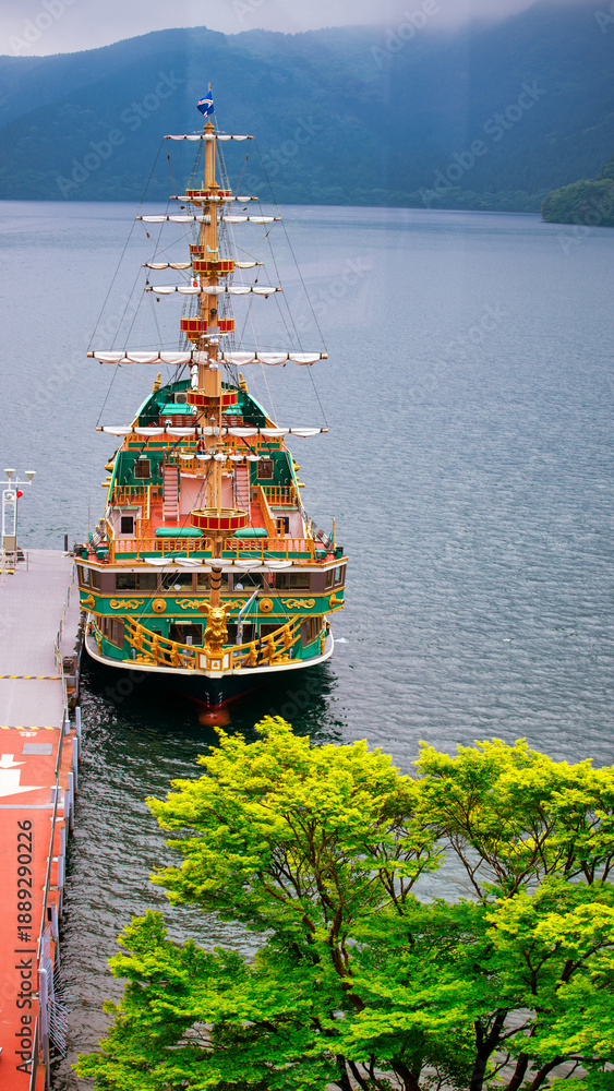 Fototapeta premium Lake Ashi with Hakone sightseeing boat in spring season