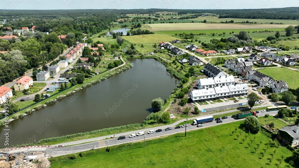 Fototapeta premium Panorama of the fields and the town.