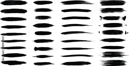 Diverse collection of artistic black brush strokes, featuring varied textures and organic shapes, perfect for adding an expressive, handmade touch to modern graphic designs and creative projects