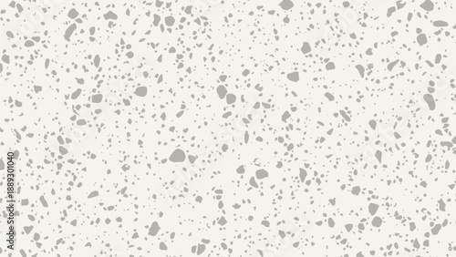 Speckled beige terrazzo texture background for design projects and creative surfaces.