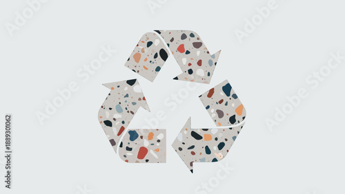 Recycling symbol made of patterned paper fragments against a pale background.