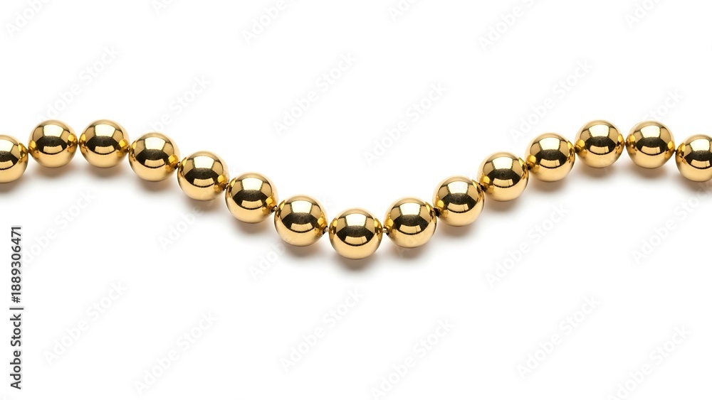 Obraz premium A strand of shiny gold spheres curves against a white backdrop, casting a soft shadow