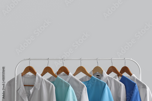 Rack with medical uniform o...