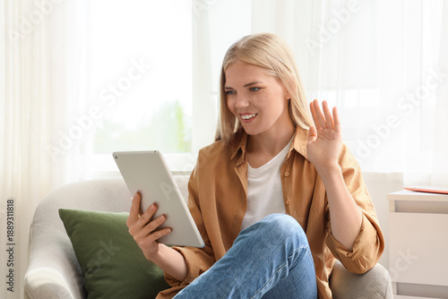 Young woman with tablet com...