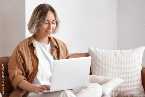 Beautiful woman using lapto...