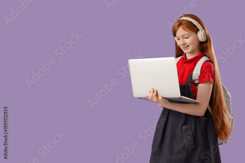 Cute schoolgirl with modern...