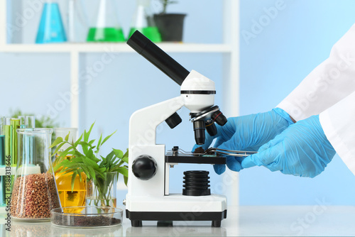 Female scientist with micro...