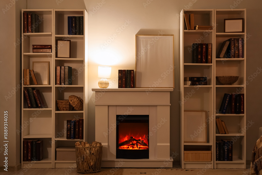 Fototapeta premium Interior of stylish room with fireplace and bookshelves at evening