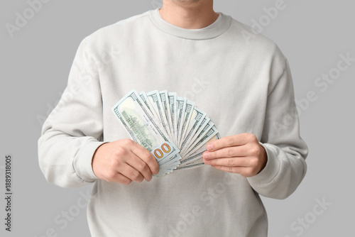 Young man with dollar bankn...