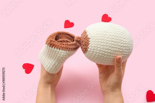 Female hands with knitted m...