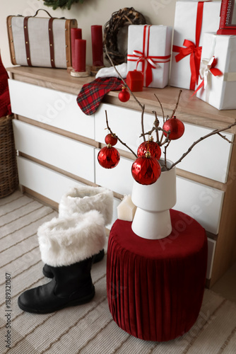Vase with tree branches and...