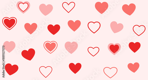 Collection of red and pink hearts in various shades and outlines on a soft pink background.