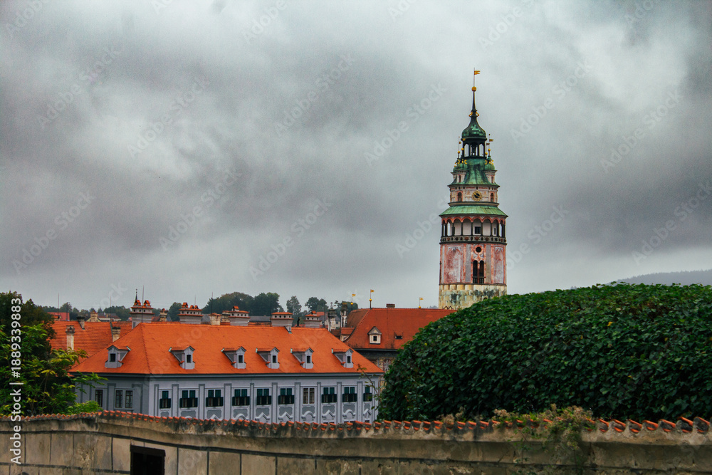 Fototapeta premium Historic tower above red rooftops 