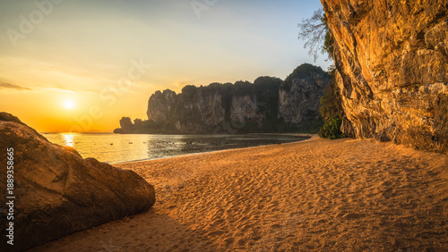 sunset at tonsai beach on tropical island railay in krabi in thailand