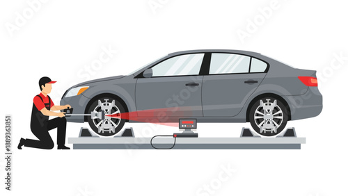 Mechanic performing precision car alignment using advanced laser technology