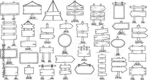 Collection of wooden signs on grassy areas for direction and information
