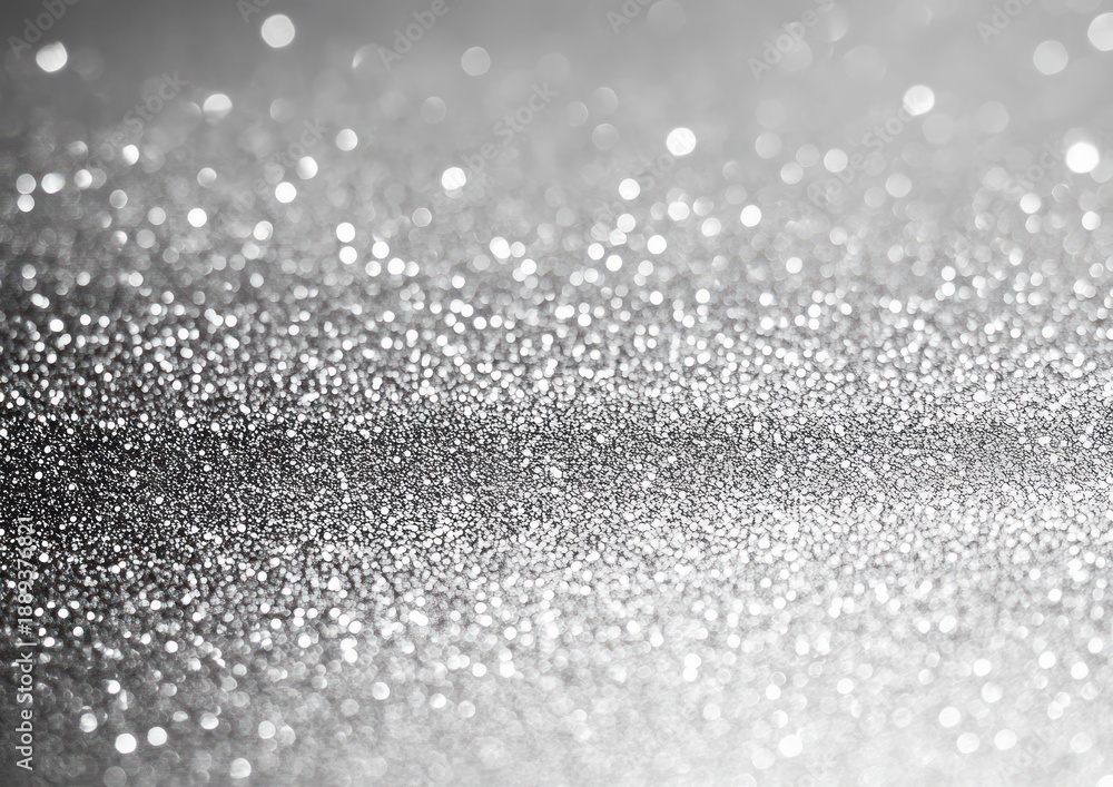 Naklejka premium Close-up of silver glitter texture with sparkling bright bokeh lights creating a shimmering pattern