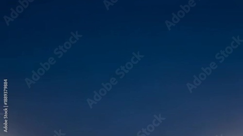 A serene blue sky video showcasing a peaceful natural landscape with vibrant colors