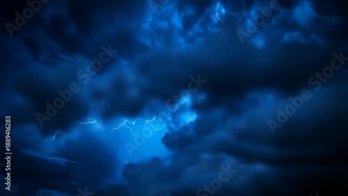Dramatic storm clouds with lightning flashes across a dark sky
