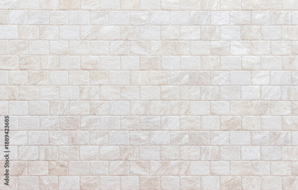 Obraz premium Detail of modern cream brick wall background photo. White light brick wall texture background for stone tile block painted in beige light color wallpaper modern interior and exterior backdrop design.