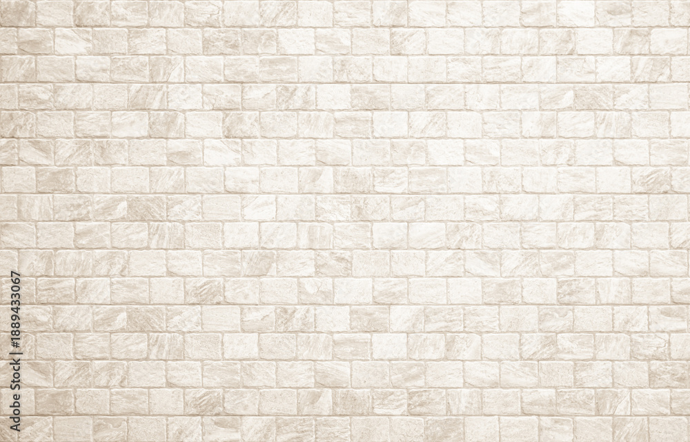 Fototapeta premium Detail of modern cream brick wall background photo. White light brick wall texture background for stone tile block painted in beige light color wallpaper modern interior and exterior backdrop design.