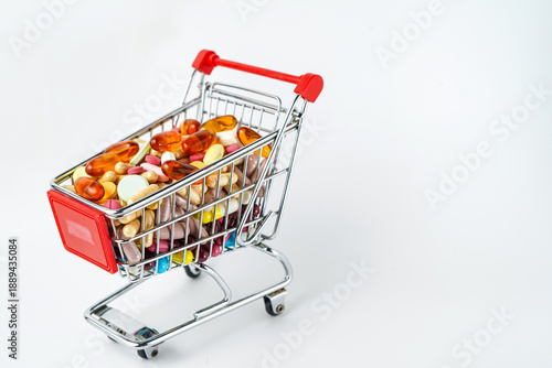 Drug store and online pharmacy concept with supermarket trolley and assorted medicine pills