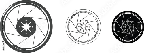 Three camera lenses in different colors on a white background