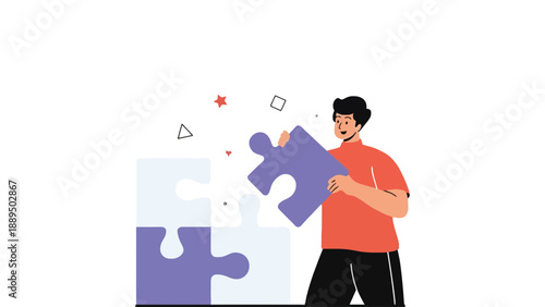A man in an orange shirt is putting together a puzzle piece
