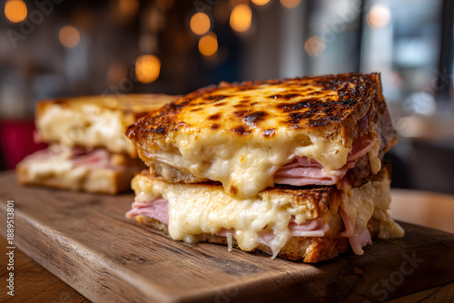 Wallpaper Mural Delicious Croque Monsieur Sandwich with Melted Cheese and Ham on Wooden Serving Board Torontodigital.ca