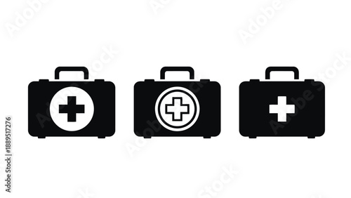 Three black medical first aid kits with white crosses on a plain background
