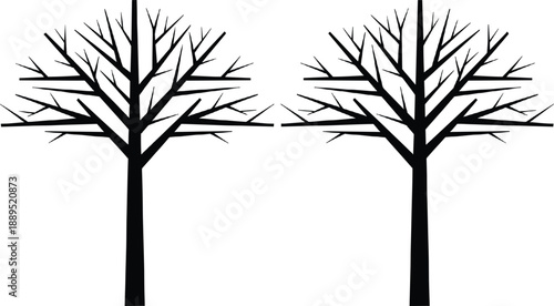 Set of two black bare tree silhouettes with leafless branches isolated on grey background