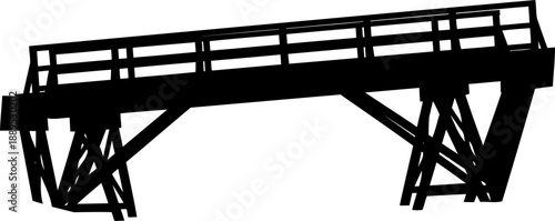 Old timber railway trestle bridge silhouette