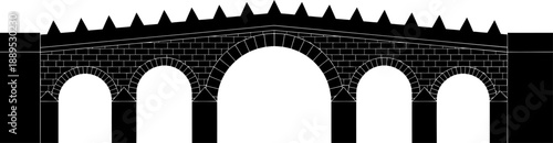 Old masonry bridge silhouette with spiked battlements