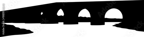 Multi arch stone viaduct silhouette spanning a wide river