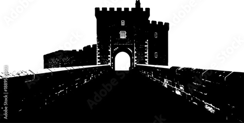 Medieval castle gatehouse silhouette with stone bridge entrance