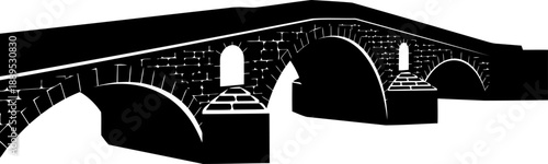 Historic multi-arch stone bridge silhouette with brick detail