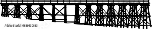 Historic wooden trestle bridge silhouette for railway or trail use