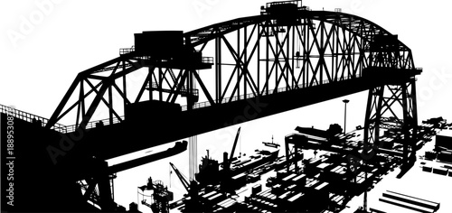 Heavy industrial harbor gantry crane and bridge silhouette
