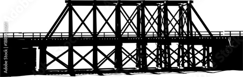 Detailed silhouette of a complex timber trestle bridge framework
