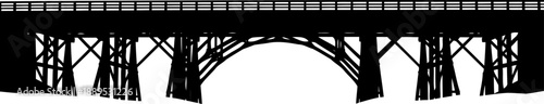 Arched timber bridge silhouette with complex wooden support trusses