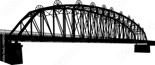 Arched steel bridge with decorative circular truss elements
