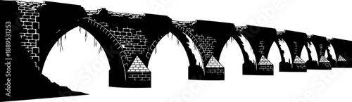 Ancient ruined stone aqueduct silhouette with multiple crumbling arches