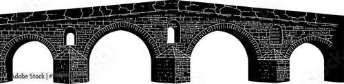 Ancient stone masonry bridge with multiple arches and brickwork texture